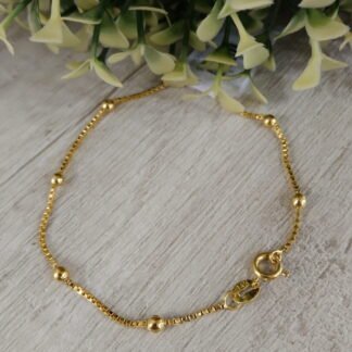 Pulsera Oro goldfield pelotitas