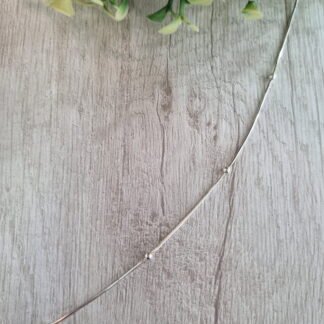 Tobillera plata pelotitas