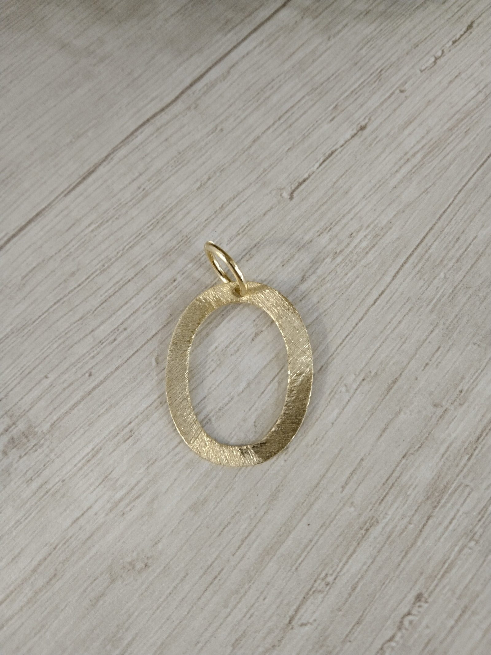 Letra Ba?o en oro O