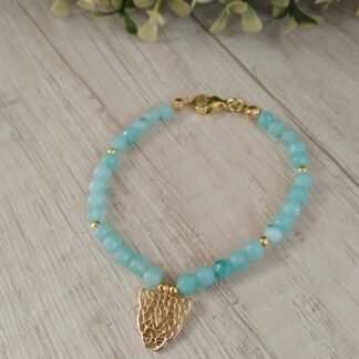 Pulsera agatas celestes con colgante ba?o en oro pantera
