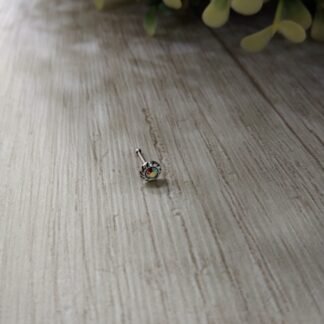 Piercing circon tornasol