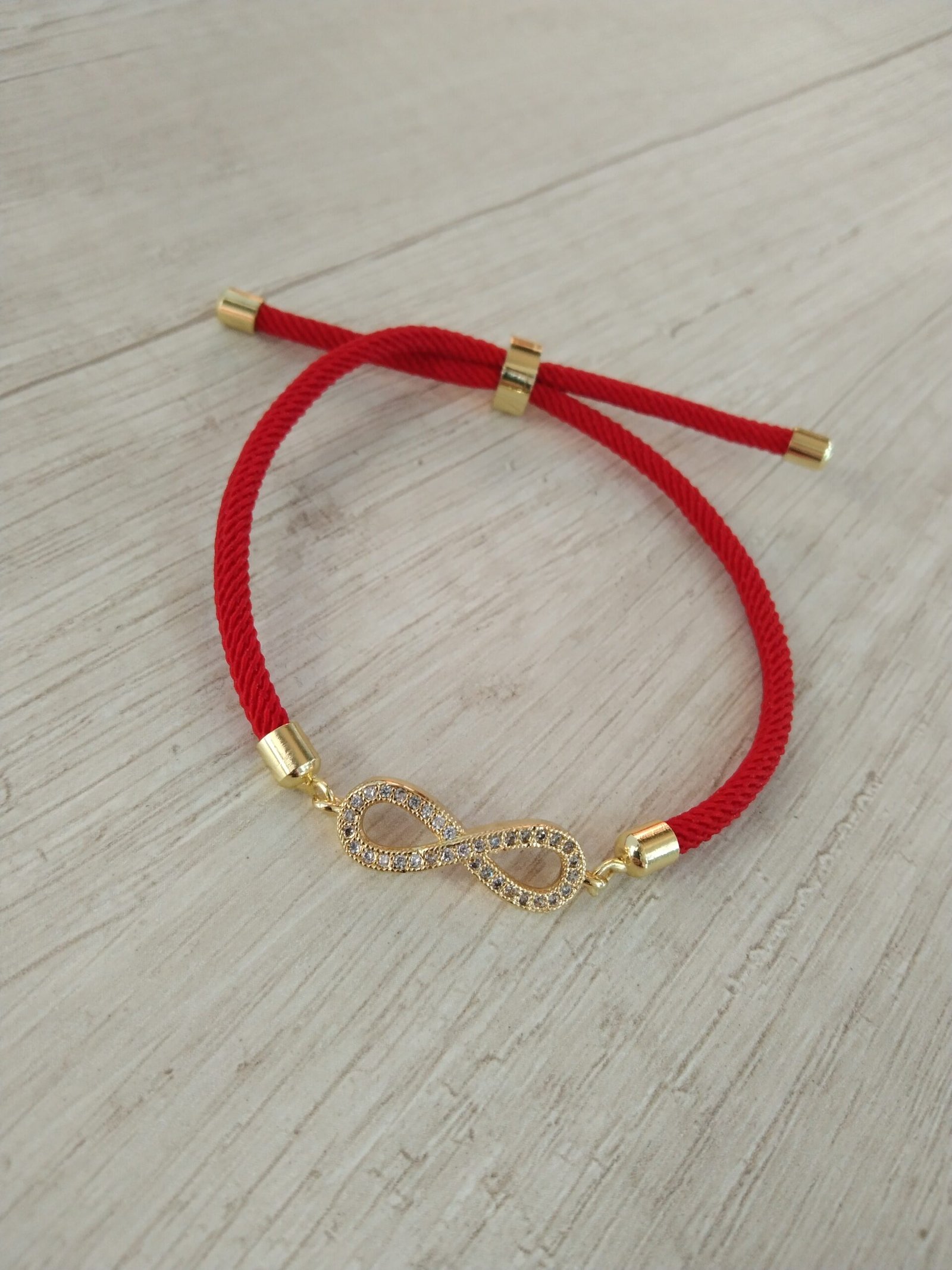 Pulsera ba?o en oro roja infinito