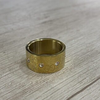 Anillo acero dorado circones nro 14