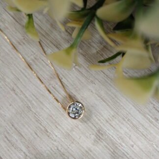 Collar punto de luz 18k
