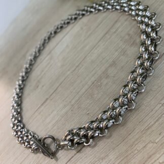 Collar acero dorado broche tim?n