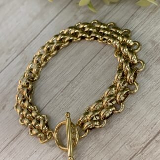 Pulsera acero dorada broche tim?n