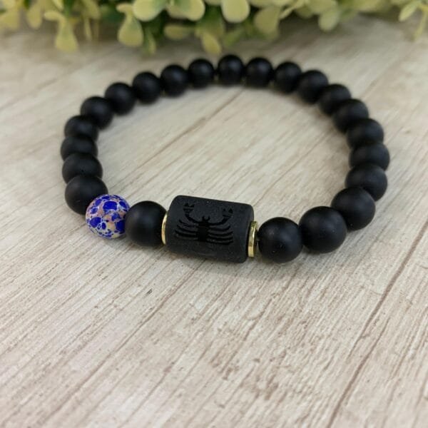 Pulsera Escorpio Piedra Volcánica elasticada