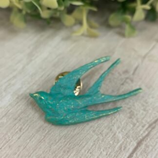 Prendedor Golondrina Calipso/dorada