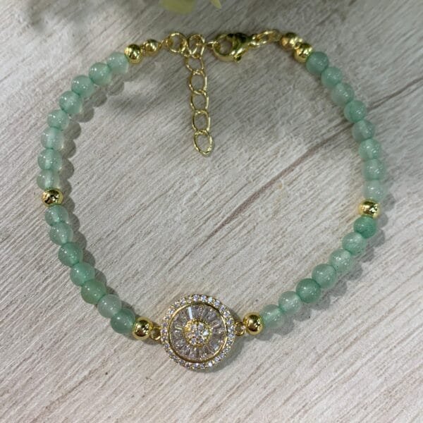 Pulsera Jade Flor circones baño oro