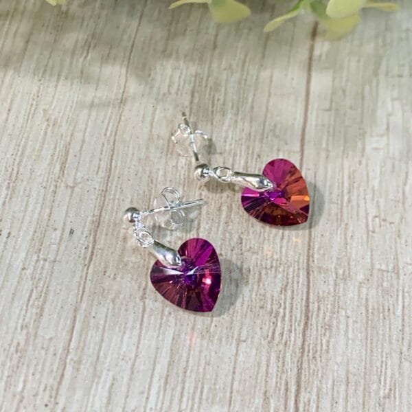Aros plata corazón fucsia tornasol
