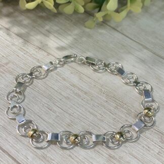 Pulsera Plata con oro argollas