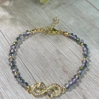 Pulsera infinito cristales tornasol ba?o oro