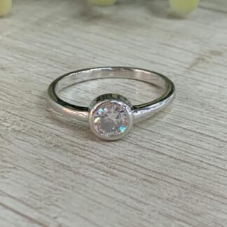 Anillo plata rodinada punto de luz
