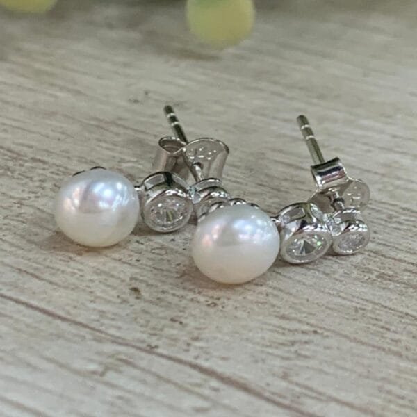 Aros plata rodinada perla doble microcircon