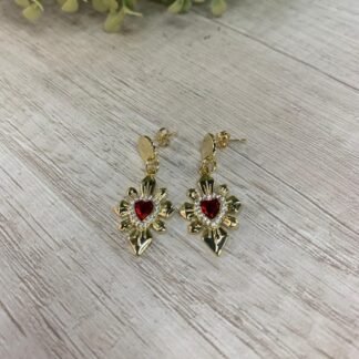 Aros corazon rojo detente baño oro