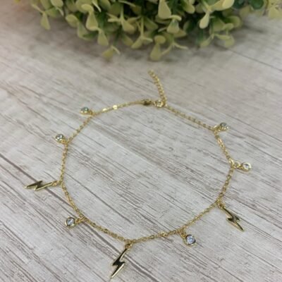 Tobillera Plata Baño en oro rayos y circones.