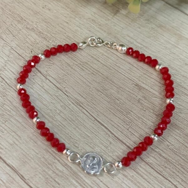 Pulsera plata cristales rojos dije san benito 21 cm