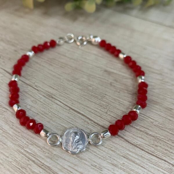 Pulsera plata cristales rojos dije san benito 18 cm