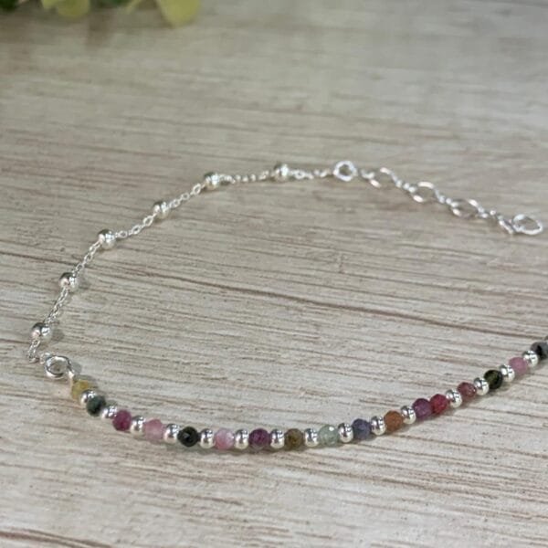 Pulser plata cristales multicolor y esferas