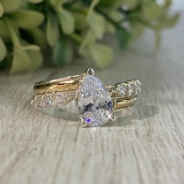 Anillo plata oro N 14 circon pera