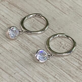 Aros plata rodinada huggies punto de luz