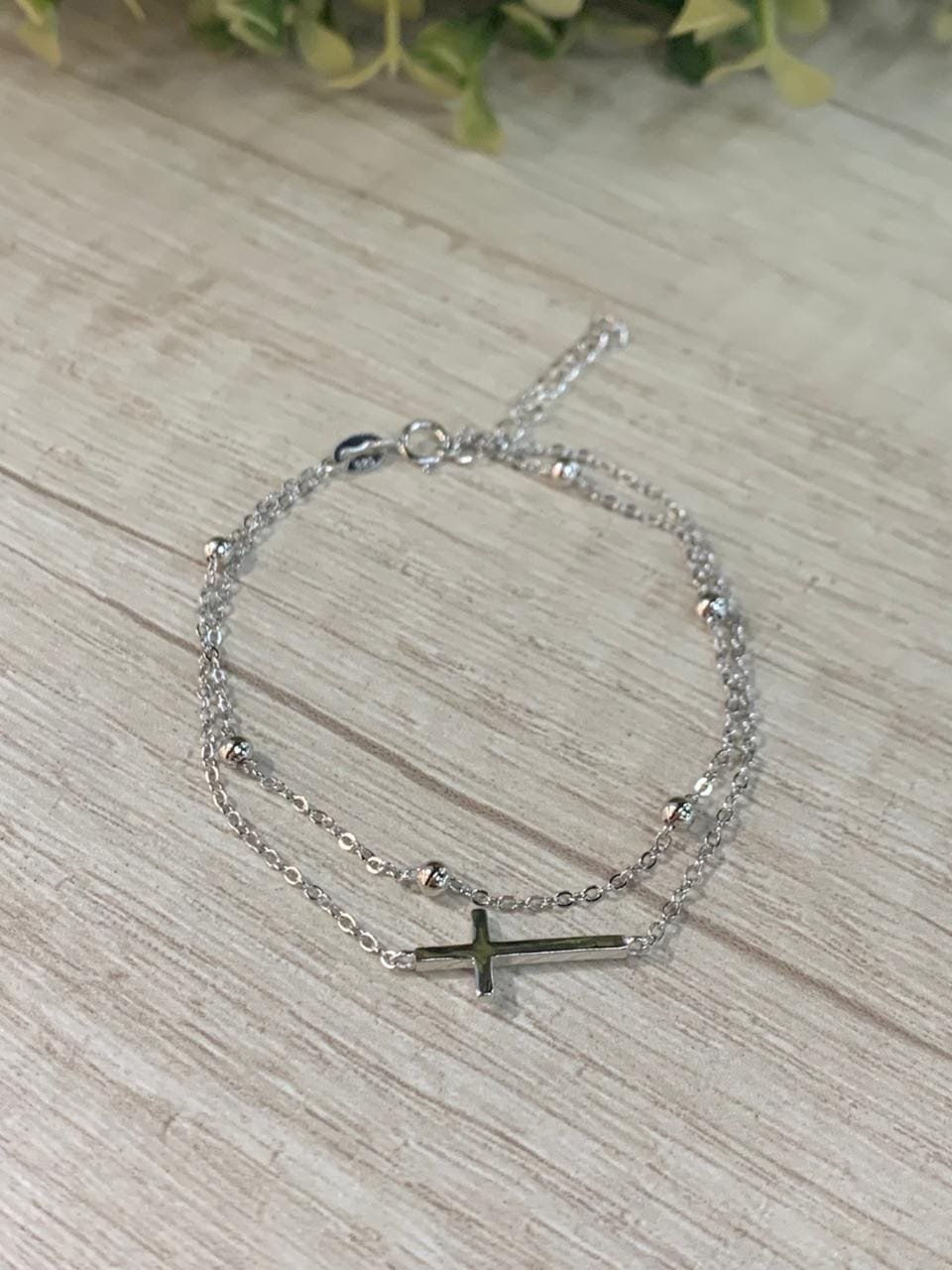 WhatsApp Image 2026-02-23 at 14.19.25 (2) Pulsera plata rodinada doble cruz y esferas - Imagen 1