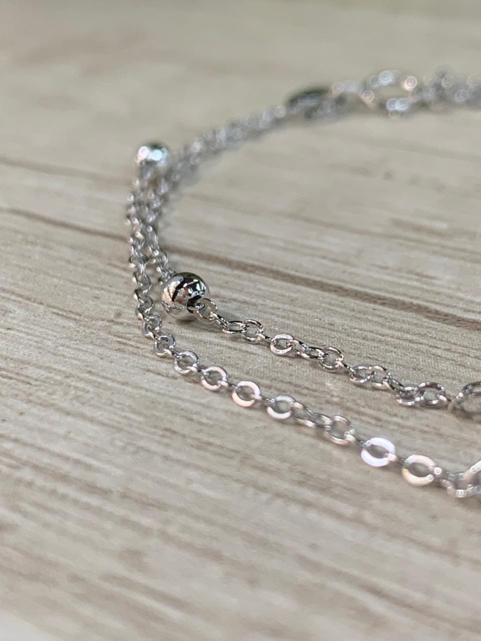 WhatsApp Image 2026-02-23 at 14.19.26 Pulsera plata rodinada doble cruz y esferas - Imagen 3