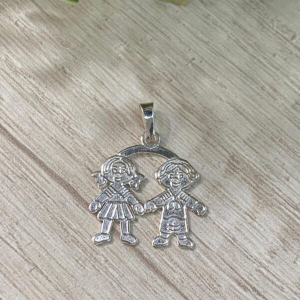 Colgante plata 950 niña y niño