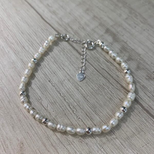 Pulsera plata perla de rio