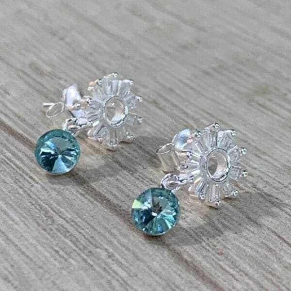 Aros plata flor circones cristal swarovski celeste