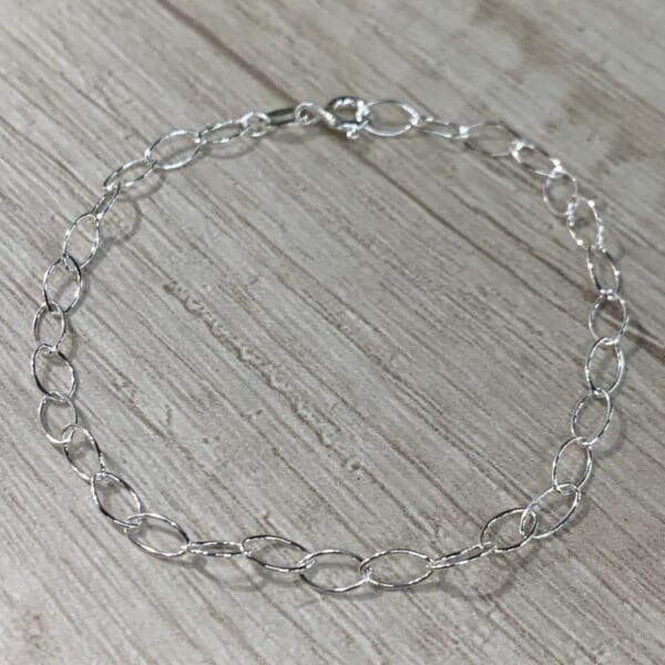 Pulsera plata ovalos entrelazados