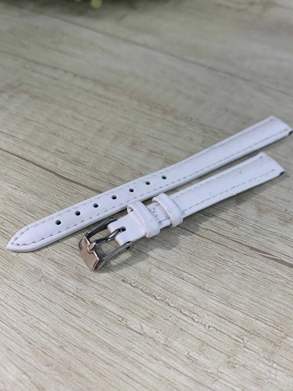WhatsApp Image 2026-03-30 at 17.06.12 Correa de cuero blanca hebilla plateada 12 mm - Imagen 1