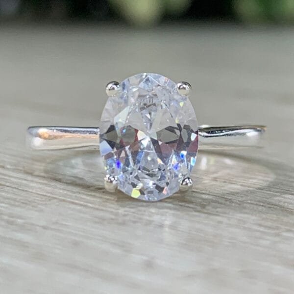 Anillo plata circon solitario 4 grifas N13