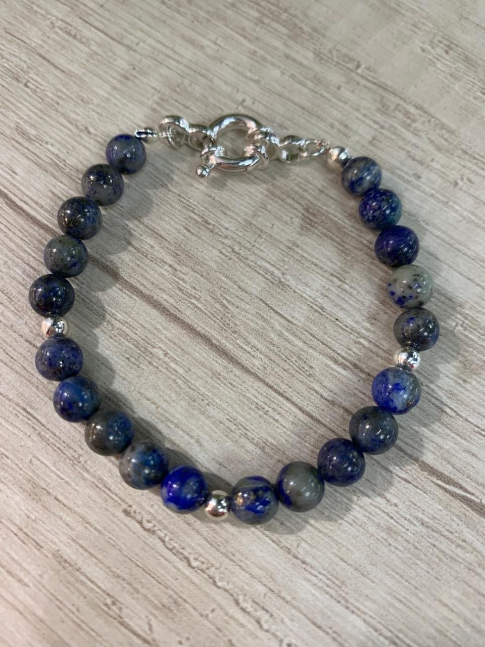 WhatsApp Image 2026-04-09 at 12.03.36 Pulsera plata lapislazuli broche timon esferas 18 cm - Imagen 1