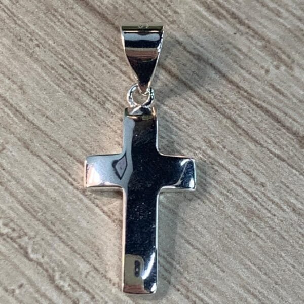 Colgante plata cruz lisa concava