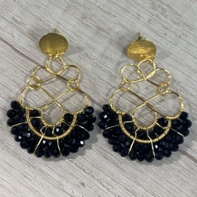 Aros abanico cristales negros baño oro