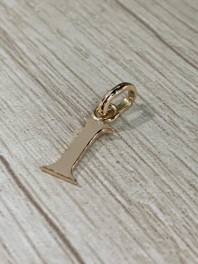 Letra Oro 18 K 0,8  gr