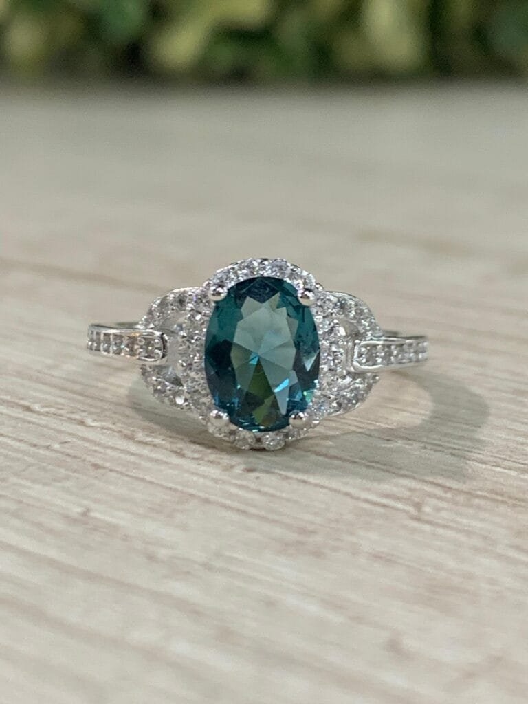 Anillo plata rodinada solitario verde azulado N12