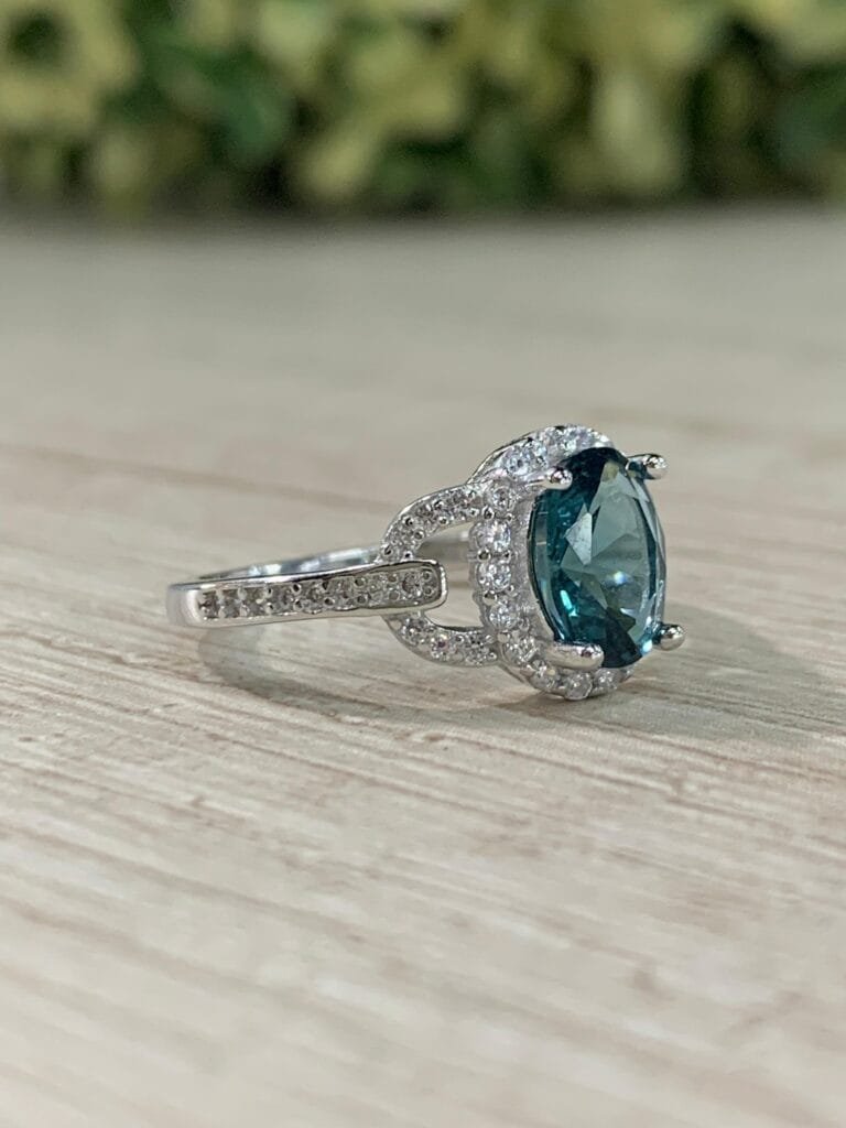 Anillo plata rodinada solitario verde azulado N12