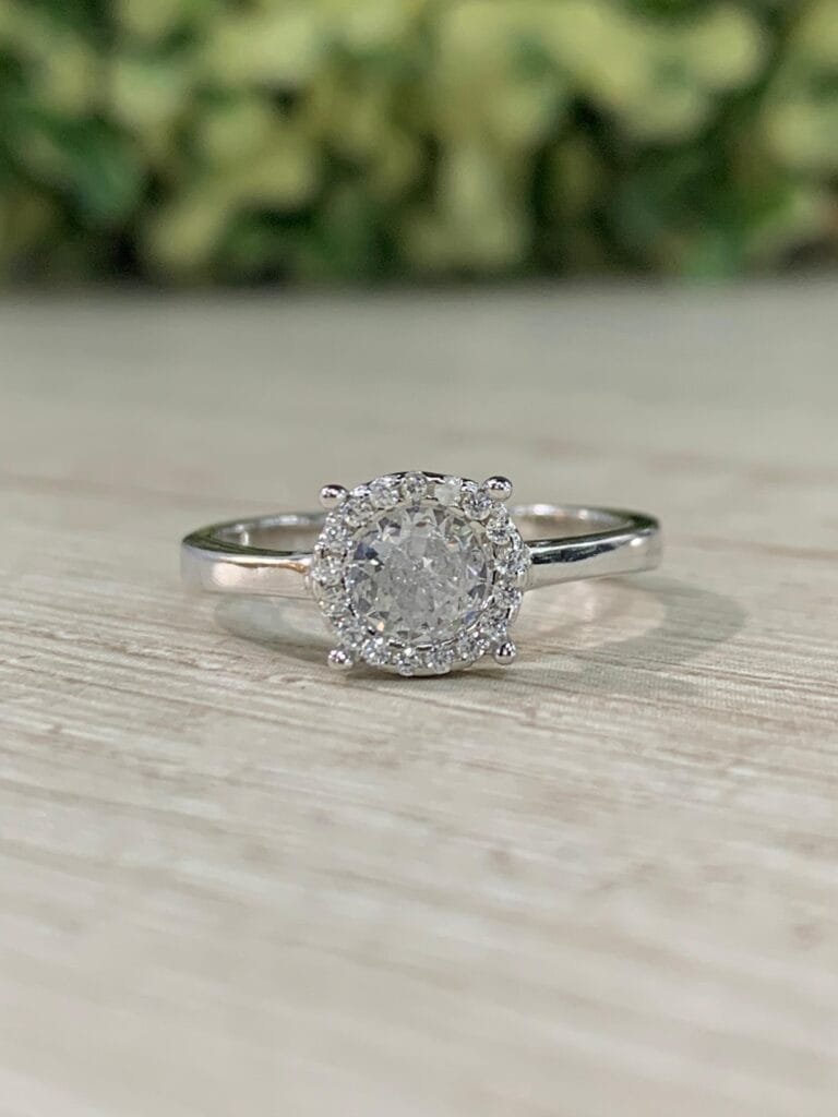 Anillo plata rodinada solitario microcircon 4 grifas N11