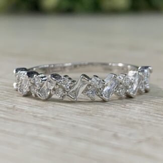 Anillo plata rodinada medio cintillo baguette N16