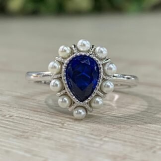 Anillo plata rodinada gota azul perla N11
