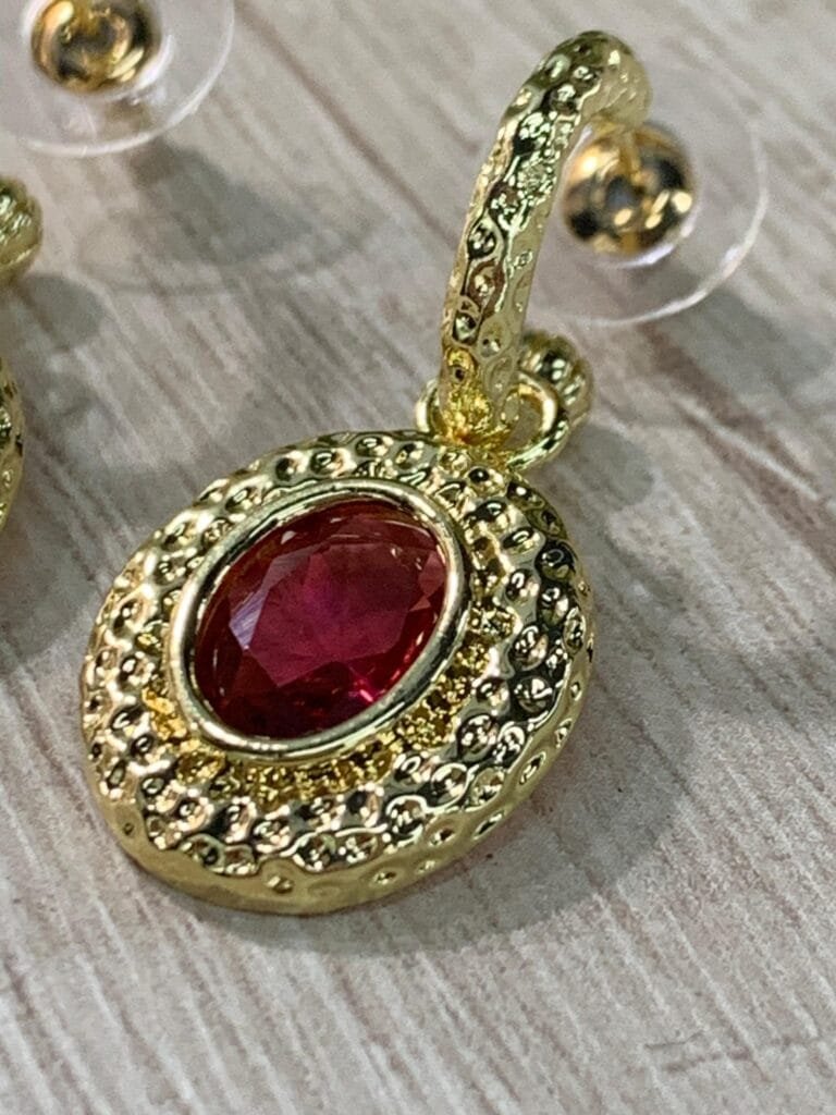 Aros semiargolla ovalo fuscia baño oro