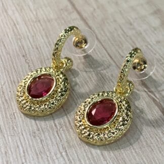 Aros semiargolla ovalo fuscia baño oro