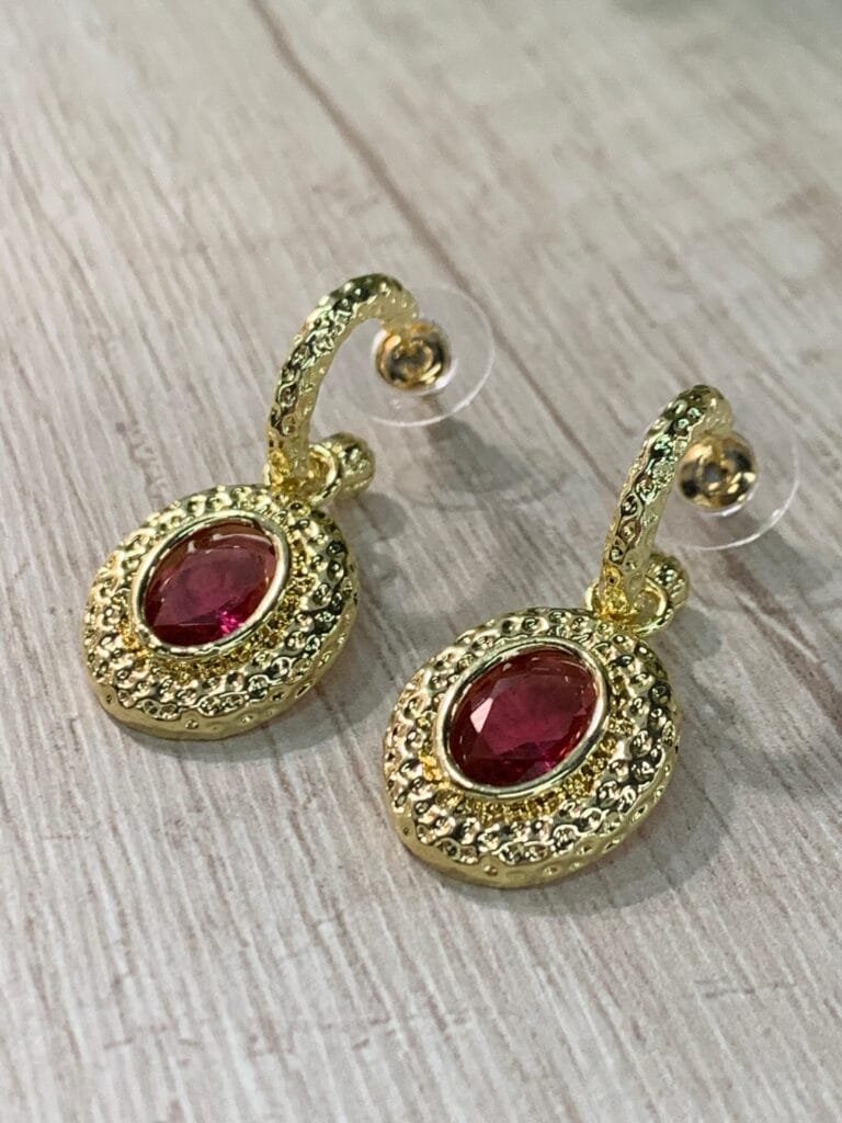 Aros semiargolla ovalo fuscia baño oro