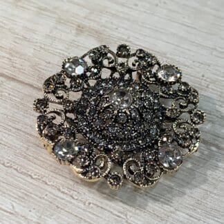 Prendedor vintage estilo turco circular envejecido