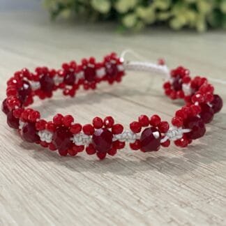Pulsera macrame cristales rojos flor 18 cm
