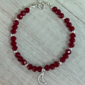 Pulsera cristales burdeo con luna calada